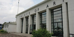 A large building with a sign that reads “Palace of Art." AI generated content