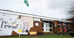 A building with a green flag on top of it. AI generated content